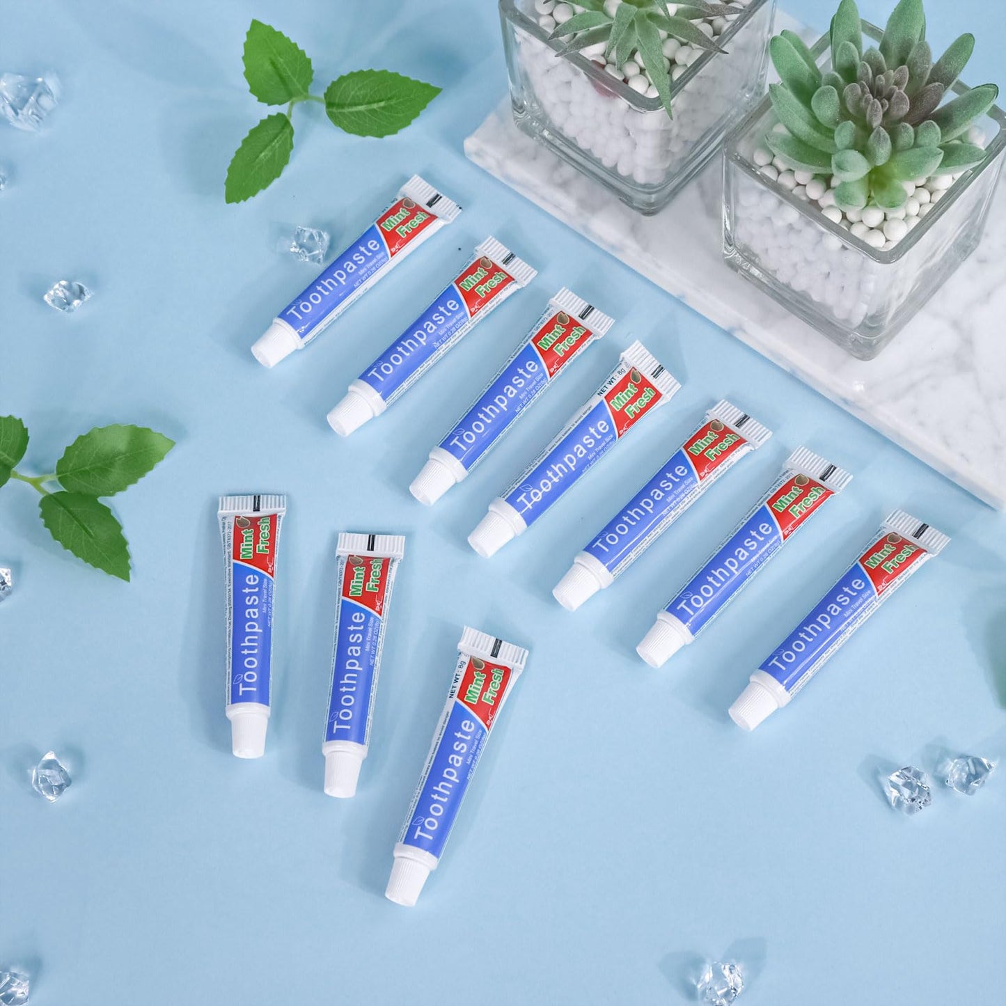 HOIQIRY 0.28 oz Mini Toothpaste 100-Pack โ Travel Size Mint, Single-Use Tubes for Hotels, Camping, Office