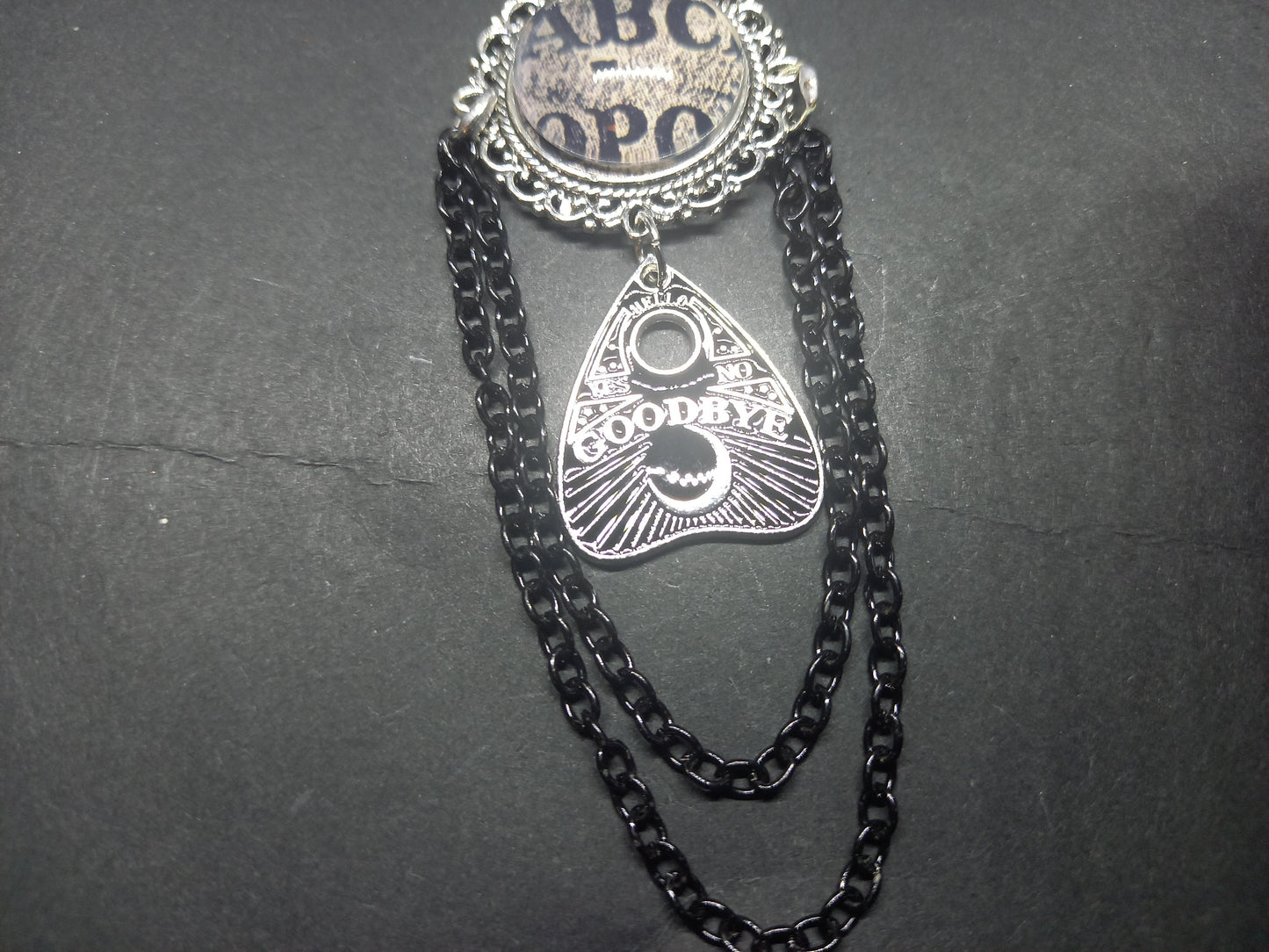 Oddity curiosity  gothic  witchy  Killstar occult " Annabelle inspired double image Ornate Brooch "with spirit board and ouija planchette & chains
