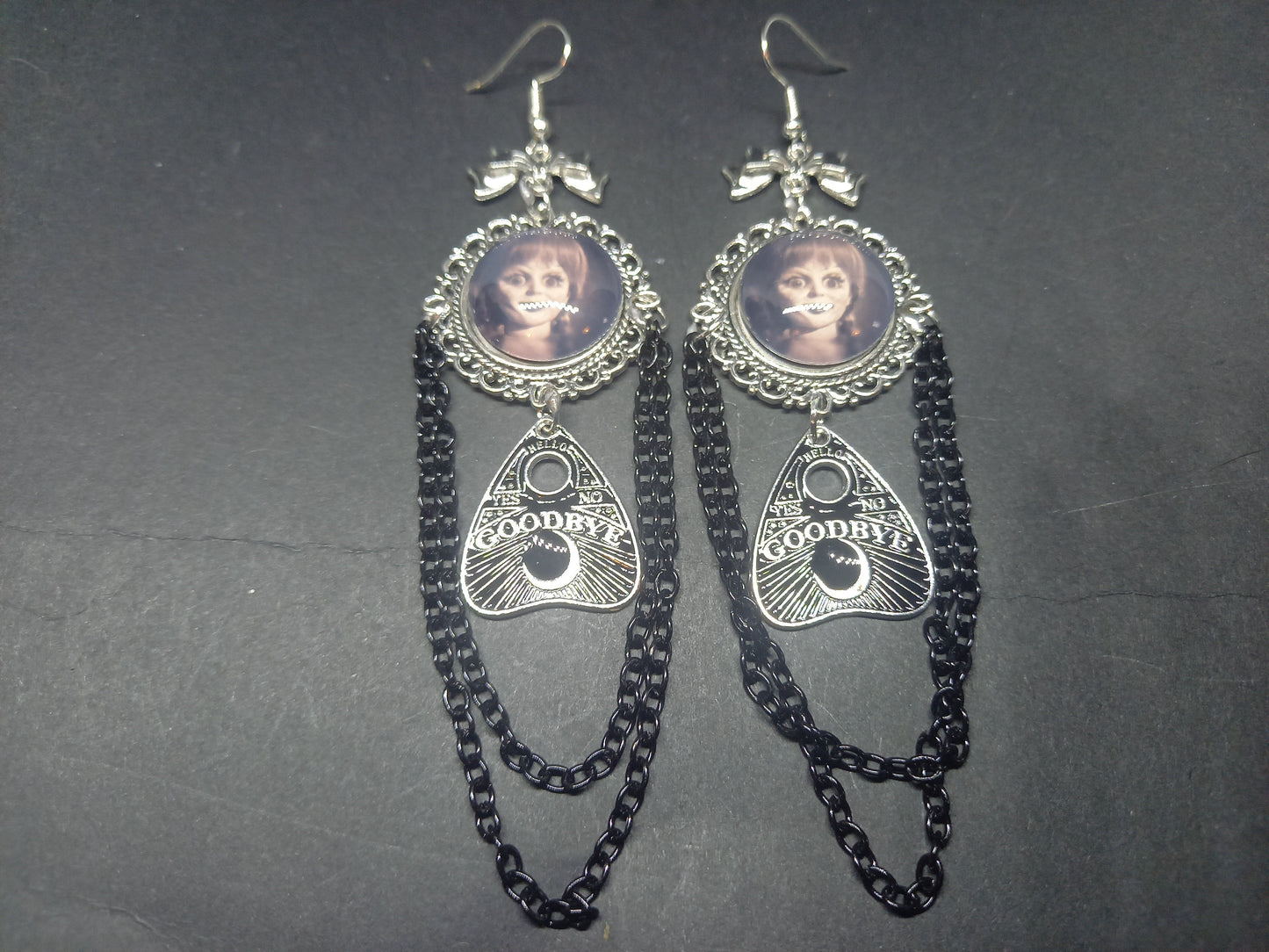 Oddity curiosity gothic witchy Killstar occult "Annabelle inspired  Doll image" deluxe Ornate earrings "with Bow and ouija planchette & chains