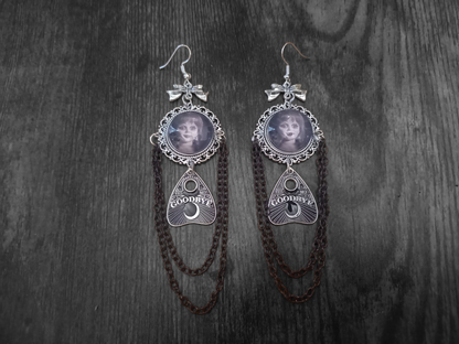 Oddity curiosity gothic witchy Killstar occult "Annabelle inspired  Doll image" deluxe Ornate earrings "with Bow and ouija planchette & chains