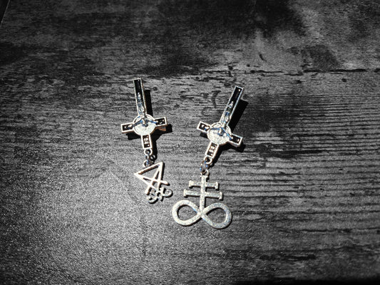 Inverted metal crucifix pin badge with satanic sigils