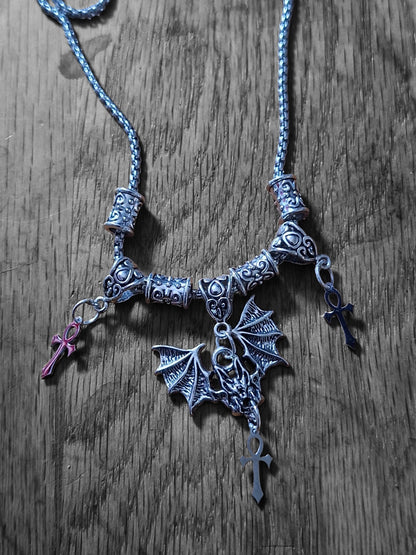 Metal Necklace with bat charm and "Vampire Masquerade ankhs"