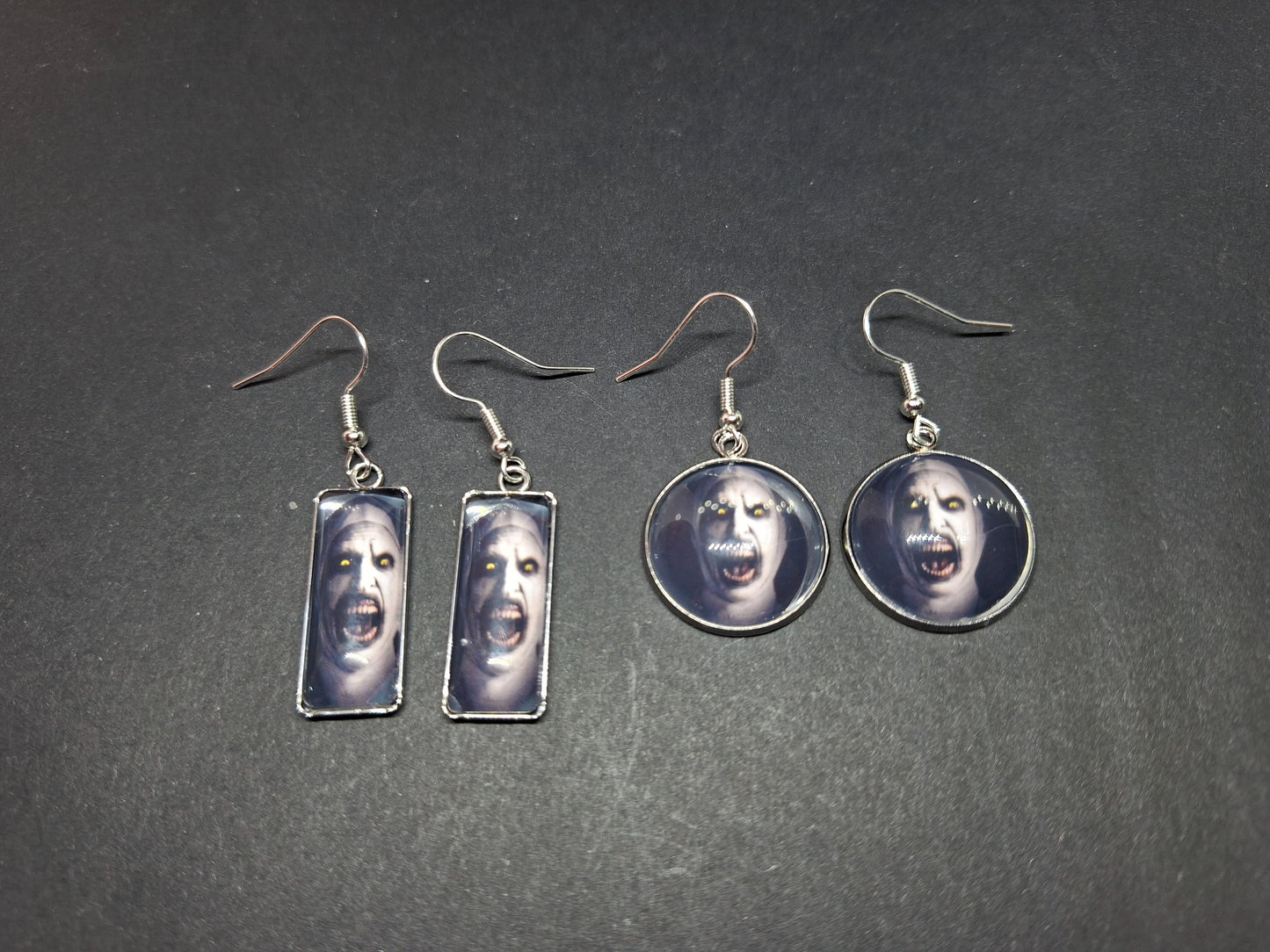 Earrings ,The Conjuring inspired "Nun" round or rectangle