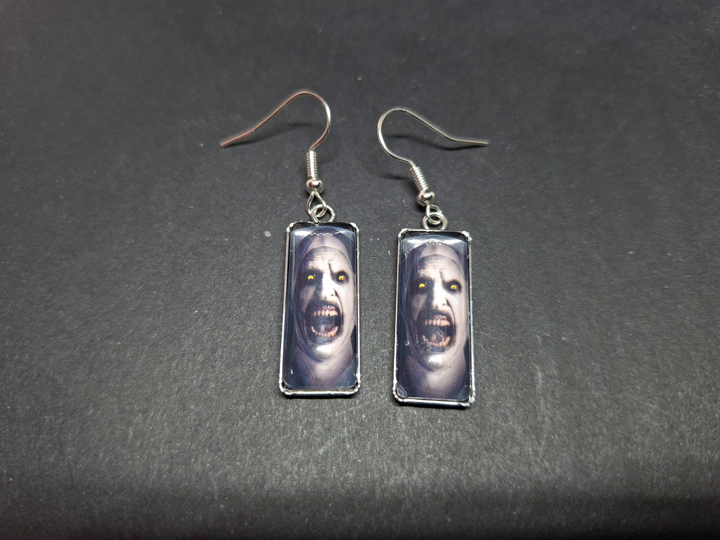 Earrings ,The Conjuring inspired "Nun" round or rectangle