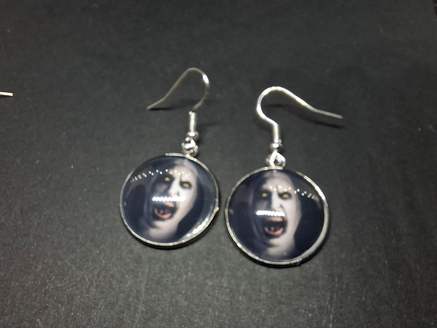 Earrings ,The Conjuring inspired "Nun" round or rectangle