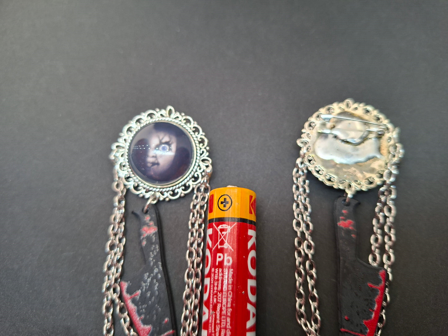 Ornate brooch with chains and blood splatter knife inspired by "Bride of Chucky " Chucky and tiffany