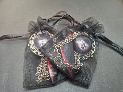 Ornate brooch with chains and blood splatter knife inspired by "Bride of Chucky " Chucky and tiffany