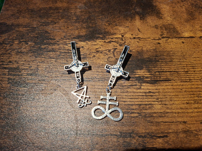 Inverted metal crucifix pin badge with satanic sigils