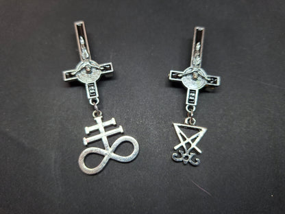 Inverted metal crucifix pin badge with satanic sigils