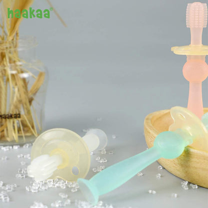 Haakaa 360° Baby Toothbrush with Suction Base – Gentle Cleaning for Toddler, Food-Grade Silicone, Adjustable Safety Shield – Pink (1 Piece)