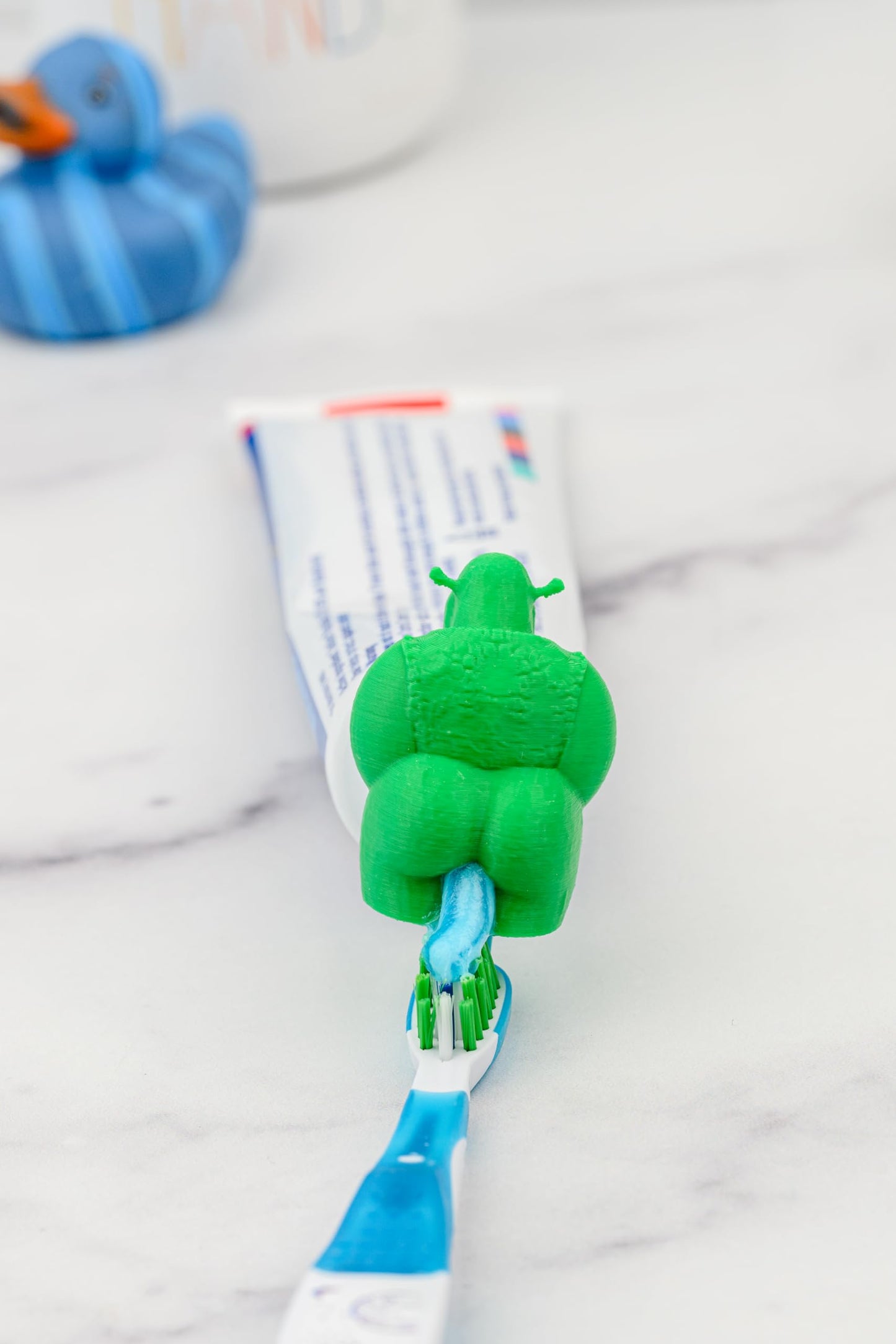 TUBECAPZ Shrek Pooping Toothpaste Topper – Adapters for Crest & Colgate Tubes